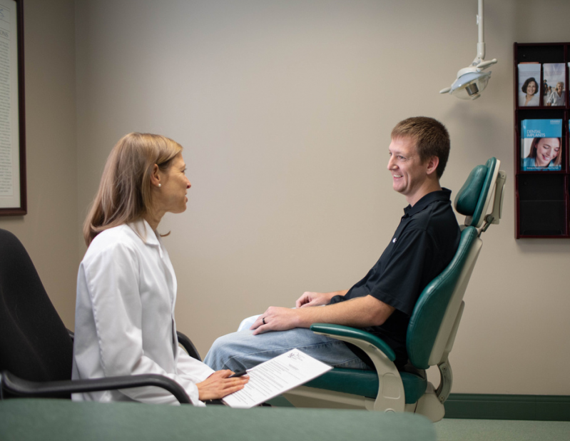 Dr and patient having a consultation in a examinea w room